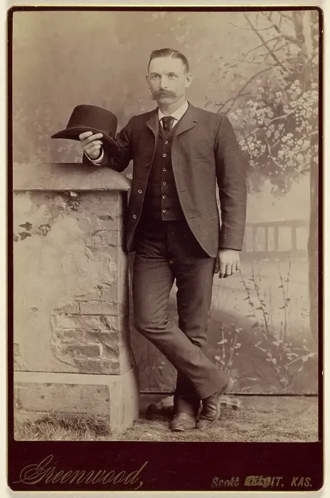 Framed Print : Studio portrait of a man holding a hat, about 1885. Creator: WH Greenwood Framed Print : Studio portrait of a man holding a hat, about 1885. Creator: WH Greenwood