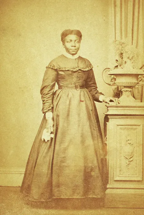 Framed Print : Studio portrait of unidentified woman holding handkerchief, c1860-c1869. Creator: Sims Photograph Gallery Framed Print : Studio portrait of unidentified woman holding handkerchief, c1860-c1869. Creator: Sims Photograph Gallery