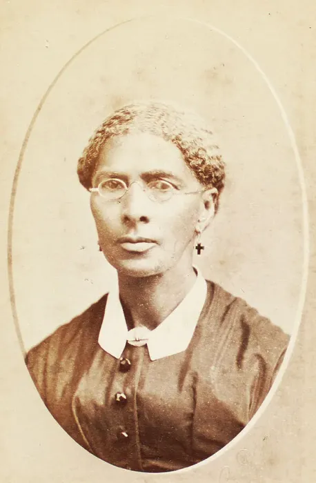 Framed Print : Studio portrait of woman wearing glasses and cross-shaped earrings, c1880-c1889. Creator: George Daniels Morse Framed Print : Studio portrait of woman wearing glasses and cross-shaped earrings, c1880-c1889. Creator: George Daniels Morse