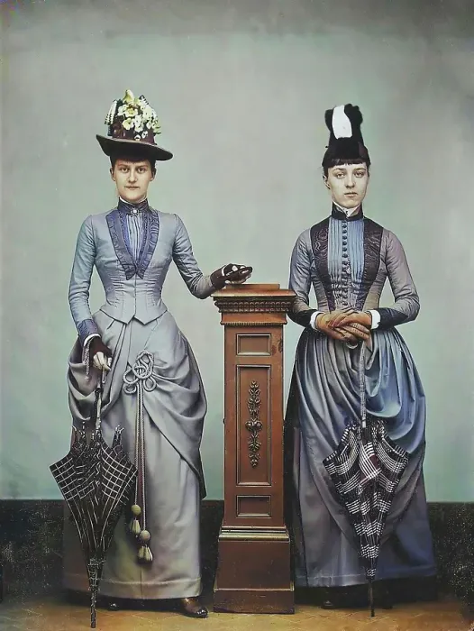 Framed Print : Studio Portrait of Two Women Holding Folded Parasols, ca. 1885. Creator: Unknown Framed Print : Studio Portrait of Two Women Holding Folded Parasols, ca. 1885. Creator: Unknown