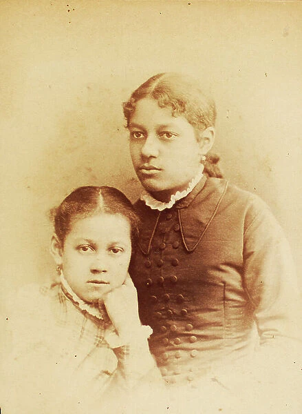 Studio portrait of two young women, c1860-c1869. Creator: HD Garns & Co. Studio portrait of two young women, c1860-c1869. Creator: HD Garns & Co
