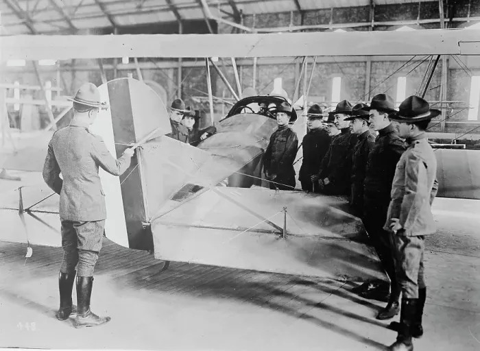 Framed Print : Studying aeroplane [i.e. airplane] rudder, 1917 or 1918. Creator: Bain News Service