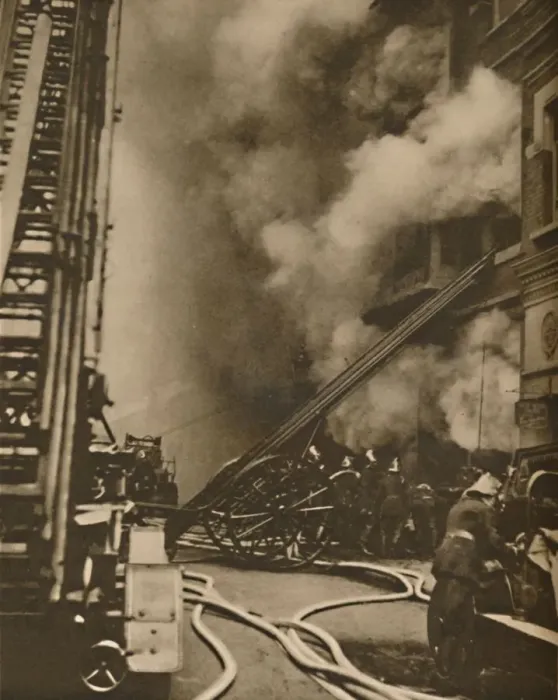 Framed Print : Subduing a Conflagration in a Narrow City Street, c1935. Creator: Unknown Framed Print : Subduing a Conflagration in a Narrow City Street, c1935. Creator: Unknown