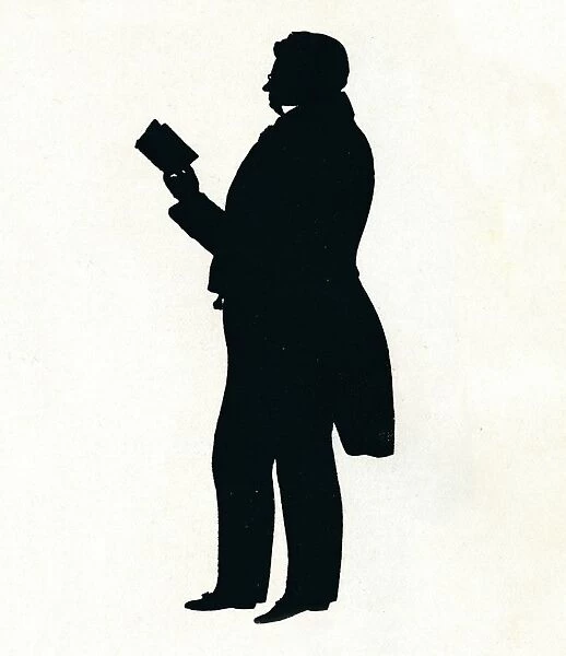 Supposititious Silhouette of William Makepeace Thackeray Reading, c19th century. (1911)