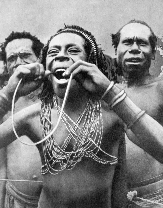 Framed Print : Swallowing canes in a ceremonial ritual, New Guinea, 1936. Artist: Wide World Photos Framed Print : Swallowing canes in a ceremonial ritual, New Guinea, 1936. Artist: Wide World Photos