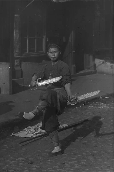 The sword dancer, Chinatown, San Francisco, between 1896 and 1906. Creator: Arnold Genthe