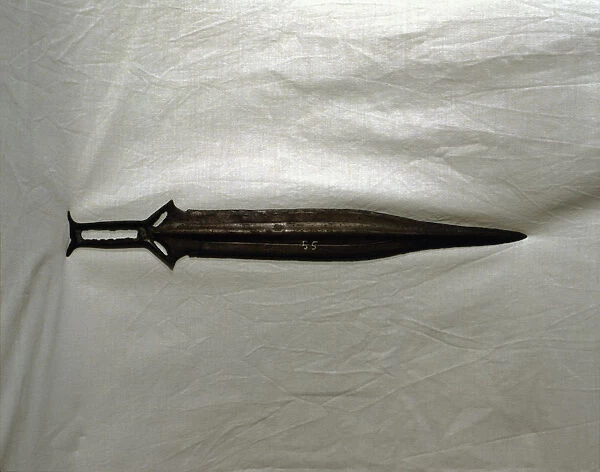 Sword of three parts barb, carps tongue shaped blade, from Palma del Rio (Cordoba)