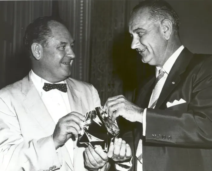 Framed Print : T. Keith Glennan shows Lyndon Johnson aluminized mylar flim used to make the Echo I Framed Print : T. Keith Glennan shows Lyndon Johnson aluminized mylar flim used to make the Echo I