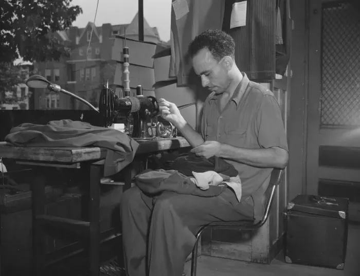 Framed Print : A tailor in Franks cleaning and pressing establishment altering a pair... Washington, D.C. 1942. Creator: Gordon Parks Framed Print : A tailor in Franks cleaning and pressing establishment altering a pair... Washington, D.C. 1942. Creator: Gordon Parks