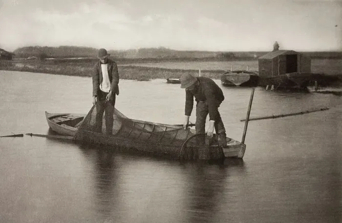 Framed Print : Taking Up the Eel-Net, 1886. Creator: Peter Henry Emerson Framed Print : Taking Up the Eel-Net, 1886. Creator: Peter Henry Emerson