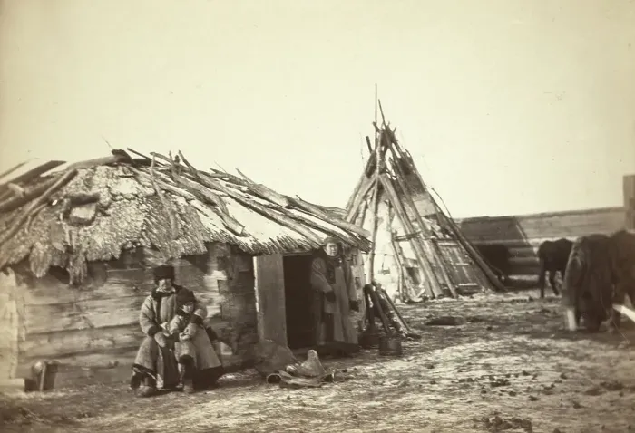 Framed Print : Tatar couple with a small boy in front of their home, between 1885 and 1886. Creator: Unknown Framed Print : Tatar couple with a small boy in front of their home, between 1885 and 1886. Creator: Unknown