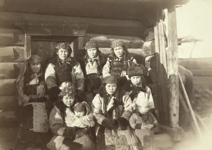 Framed Print : Tatar women with children seated in front of their home, between 1885 and 1886. Creator: Unknown Framed Print : Tatar women with children seated in front of their home, between 1885 and 1886. Creator: Unknown