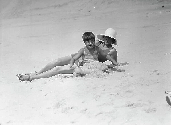 Taylor, Fenton, Mrs. and child, at the beach, 1931 Creator: Arnold Genthe