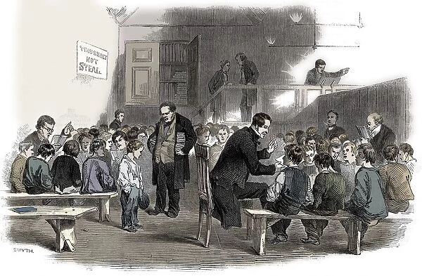 Teaching boys to read in the Ragged School Union school, Lambeth, London, 1868