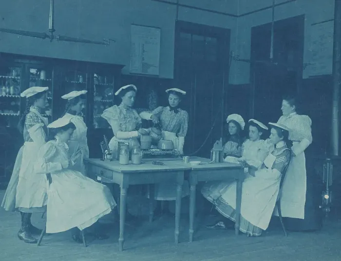 Framed Print : Eight teenage girls wearing aprons and chef caps learning to cook...Washington DC high school, 1899? Creator: Frances Benjamin Johnston Framed Print : Eight teenage girls wearing aprons and chef caps learning to cook...Washington DC high school, 1899? Creator: Frances Benjamin Johnston