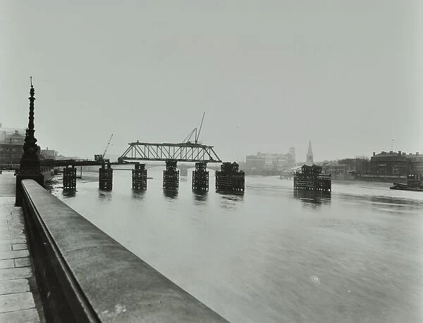 Temporary bridge over the River Thames being dismantled, London, 1948