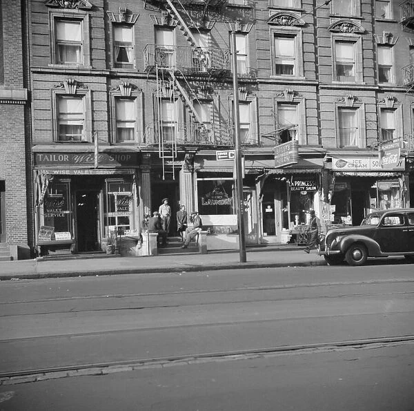 A tenament house in Harlem, New York, 1943. Creator: Gordon Parks