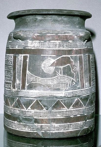 Terracotta pot with motif of bird eating a fish, Susa, c2000-c1940 BC