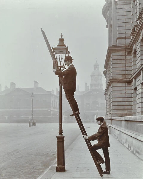 Testing gas pressure in street lighting, Westminster, London, 1910