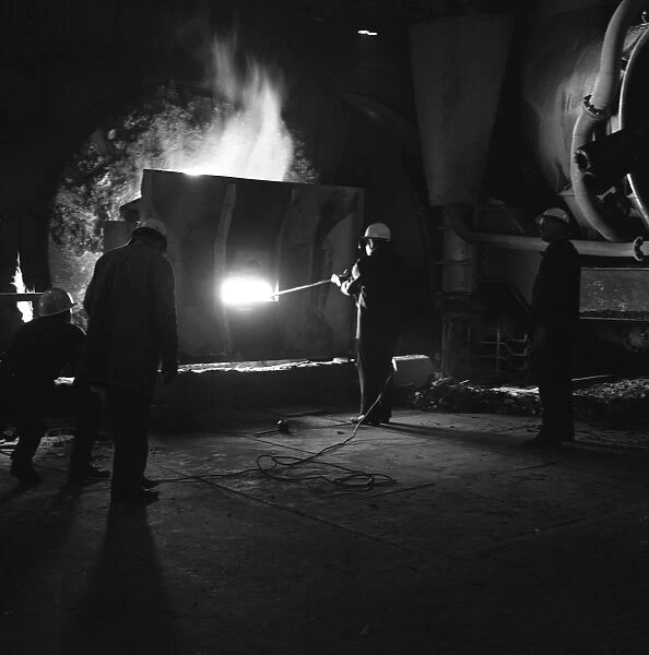 Testing temperature of molten steel, Park Gate Iron & Steel Co, Rotherham, South Yorkshire