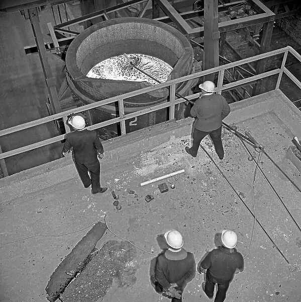 Testing the temperature of molten steel, Park Gate, Rotherham, South Yorkshire, 1964