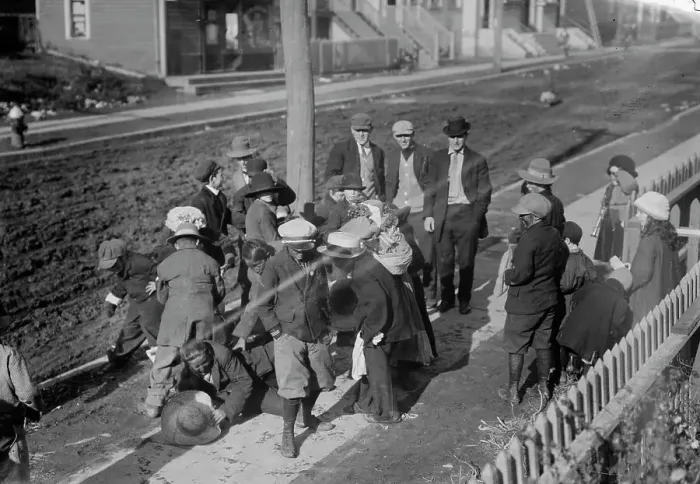 Framed Print : Thanksgiving Maskers scramble for pennies, between c1910 and c1915. Creator: Bain News Service Framed Print : Thanksgiving Maskers scramble for pennies, between c1910 and c1915. Creator: Bain News Service