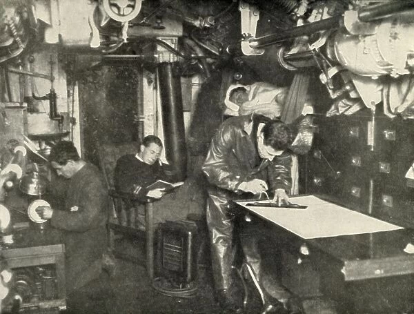 At the Bottom of the Sea. In the wardroom of a submarine, (1919). Creator: Unknown