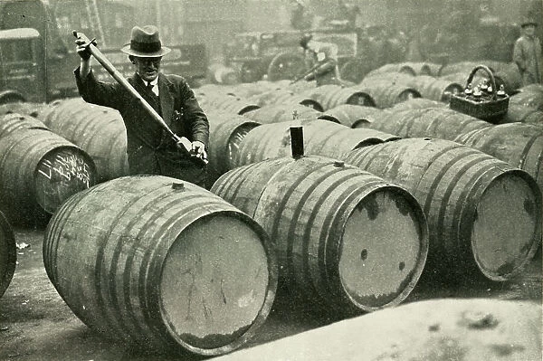 'There Are a Quarter of a Million Gallons of Port in the Port Vaults' - Wine Gauging Ground, 1937. Creator: Fox. 'There Are a Quarter of a Million Gallons of Port in the Port Vaults' - Wine Gauging Ground, 1937. Creator: Fox