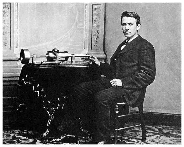 Thomas Alva Edison, American inventor, with his phonograph, c1878 (1955)