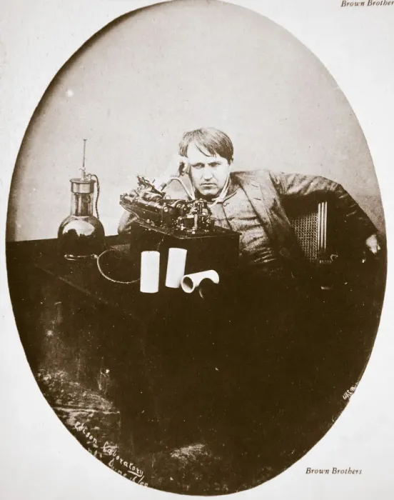 Framed Print : Thomas Alva Edison, American inventor, sitting beside his improved machine, 1889 Framed Print : Thomas Alva Edison, American inventor, sitting beside his improved machine, 1889