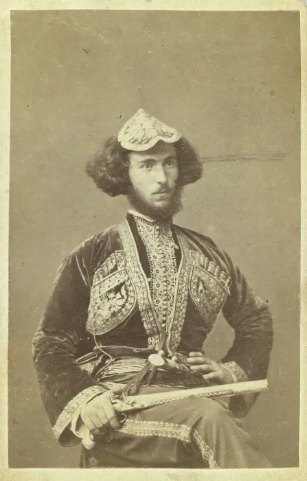 Framed Print : Three-quarter portrait of man, seated, facing right, between 1870 and 1886. Creator: Unknown