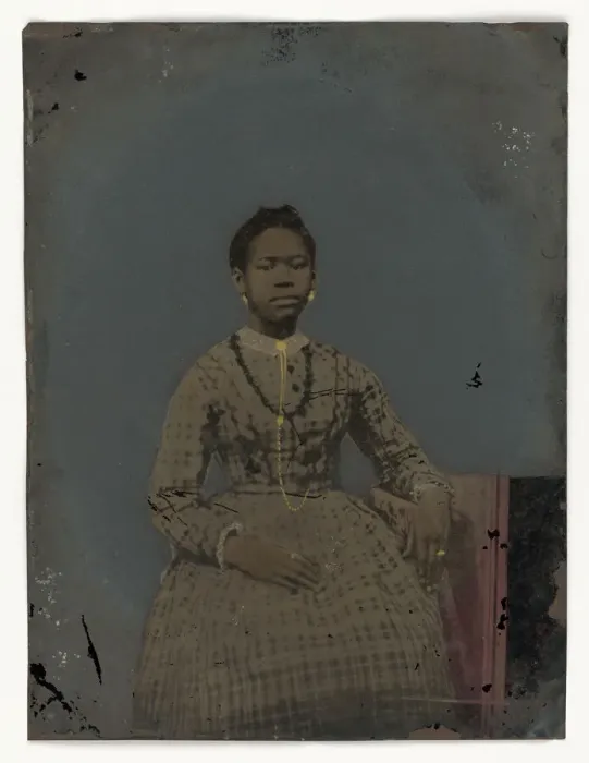 Framed Print : Tintype of a seated young woman, 1850-1875. Creator: Unknown Framed Print : Tintype of a seated young woman, 1850-1875. Creator: Unknown