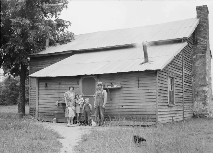 Framed Print : Tobacco sharecroppers and family at back of their house, Person County, North Carolina, 1939. Creator: Dorothea Lange Framed Print : Tobacco sharecroppers and family at back of their house, Person County, North Carolina, 1939. Creator: Dorothea Lange