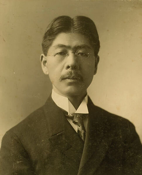 Tokutaro Sakai, head-and-shoulders portrait, facing front, c1904. Creator: J E Purdy