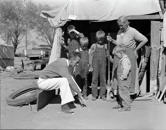 Framed Print : Tom Collins, manager of Kern migrant camp talking with drought refugee and her... CA, 1936. Creator: Dorothea Lange Framed Print : Tom Collins, manager of Kern migrant camp talking with drought refugee and her... CA, 1936. Creator: Dorothea Lange