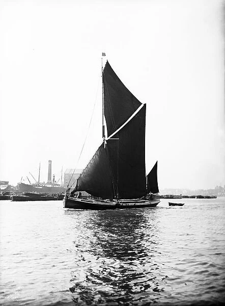 Topsail barge under sail on the Thames, London, c1905