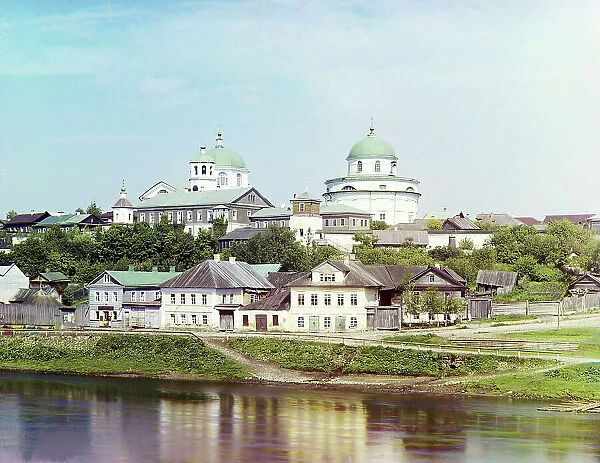 Torzhok, embankment of the river Tvertsa. In the distance, the Resurrection Monastery, 1910. Creator: Sergey Mikhaylovich Prokudin-Gorsky