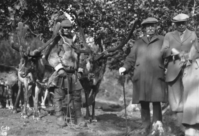 Framed Print : Tourists posing alongside a man with reindeer, Lyngen, Norway, 1929 Framed Print : Tourists posing alongside a man with reindeer, Lyngen, Norway, 1929