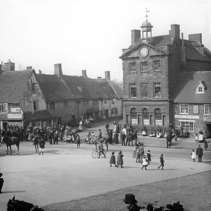 Framed Print : Town street scene - Plume of Feathers Inn, possible Dorset England, c1900s Framed Print : Town street scene - Plume of Feathers Inn, possible Dorset England, c1900s