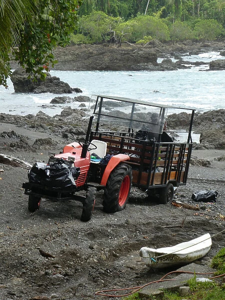 Tractor for transporting tourista and luggage from river arrival at hotel, Costa Rica 2018