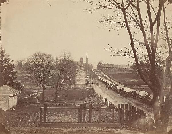 Train of Army Wagons Entering Petersburg, Virginia, April 1865. Creator: John Reekie