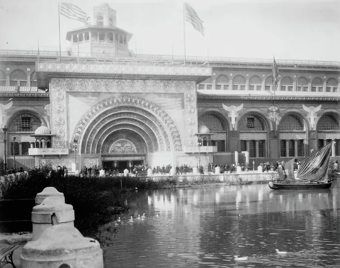Framed Print : Transportation exhibit building with canal boat and ducks on canal(?) in foreground... 1893. Creator: Frances Benjamin Johnston Framed Print : Transportation exhibit building with canal boat and ducks on canal(?) in foreground... 1893. Creator: Frances Benjamin Johnston