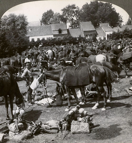 Troops feeding their horses and resting on the march, World War I, 1914-1918. Artist: Realistic Travels Publishers