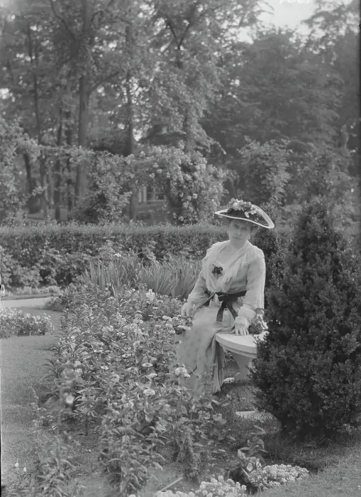 Framed Print : Truesdale, W. Mrs. standing in a garden, 1915 July 6. Creator: Arnold Genthe Framed Print : Truesdale, W. Mrs. standing in a garden, 1915 July 6. Creator: Arnold Genthe