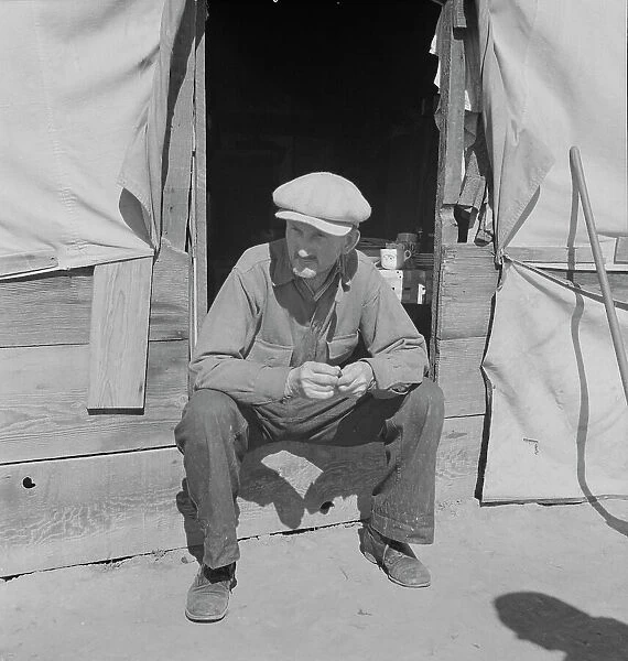Tubercular migrant in a potato pickers camp, Kern County, California, 1937. Creator: Dorothea Lange