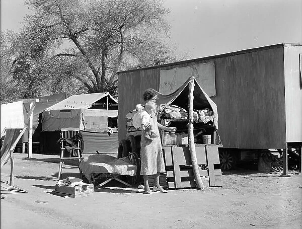 Tubercular mother from Oklahoma now living in the Kern migrant camp (resettlement), CA, 1936. Creator: Dorothea Lange