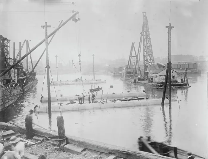 Framed Print : Tubes for subway line under Harlem River, being sunk, between c1910 and c1915. Creator: Bain News Service Framed Print : Tubes for subway line under Harlem River, being sunk, between c1910 and c1915. Creator: Bain News Service