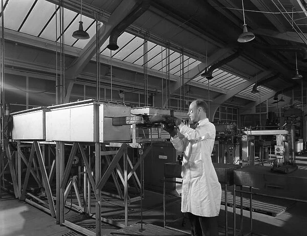 Tungsten carbide furnace being loaded, Edgar Allen Steel Co, Sheffield, South Yorkshire, 1962