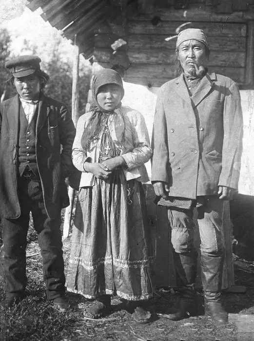 Framed Print : Two Tungus men and a woman with a cross on her chest, 1920-1939. Creator: Unknown Framed Print : Two Tungus men and a woman with a cross on her chest, 1920-1939. Creator: Unknown