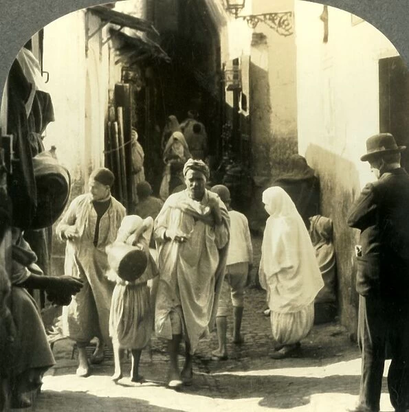 Turbaned Men and Veiled Women Crowd this Narrow Street in the Arab Quarter of Algiers Algeria
